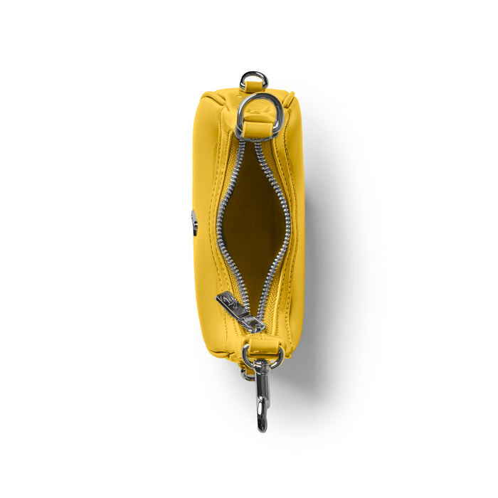 Top view of the Nano Mirror Hobo Bag in vibrant mirror yellow, featuring a zippered closure and sleek design.