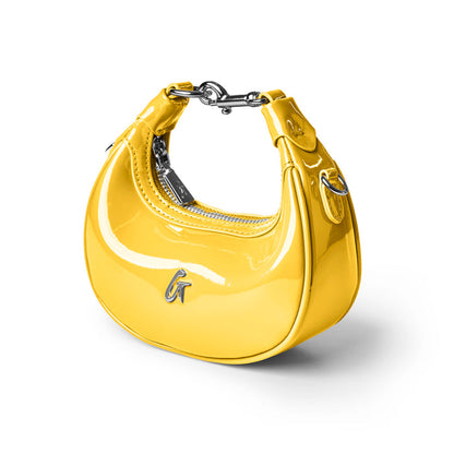 Glossy yellow hobo bag with a sleek design and silver accents, perfect for adding a pop of color to any outfit.