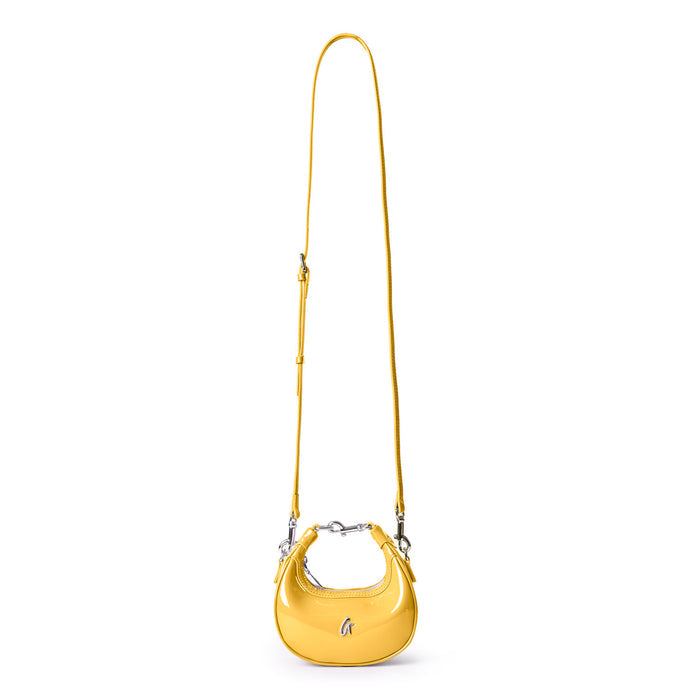 Stylish Nano Mirror Hobo Bag in vibrant mirror yellow with a sleek design and adjustable strap for versatile wear.