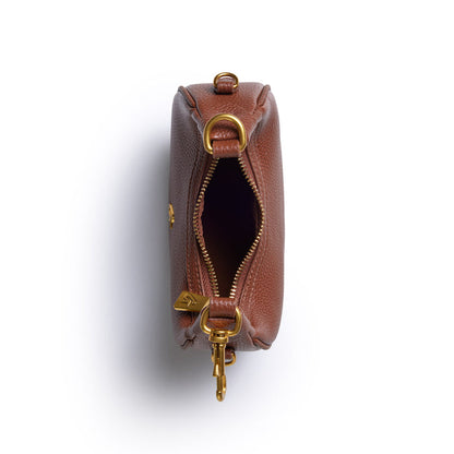 Brown Nano Pebble Hobo Bag with gold hardware, zipper closure, and textured leather finish.