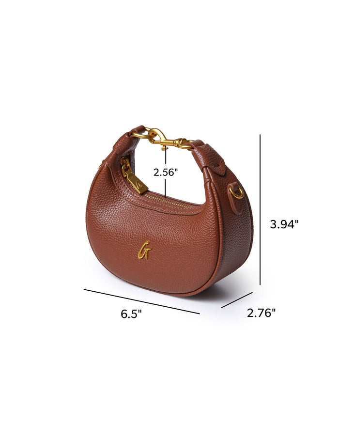 Brown Nano Pebble Hobo Bag featuring a textured finish, gold hardware, and a compact design for stylish everyday use.