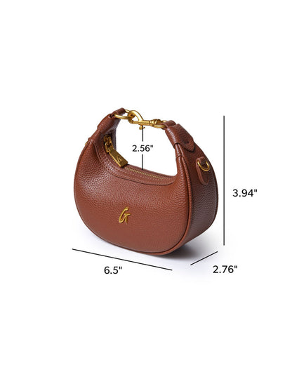 Brown Nano Pebble Hobo Bag featuring a textured finish, gold hardware, and a compact design for stylish everyday use.