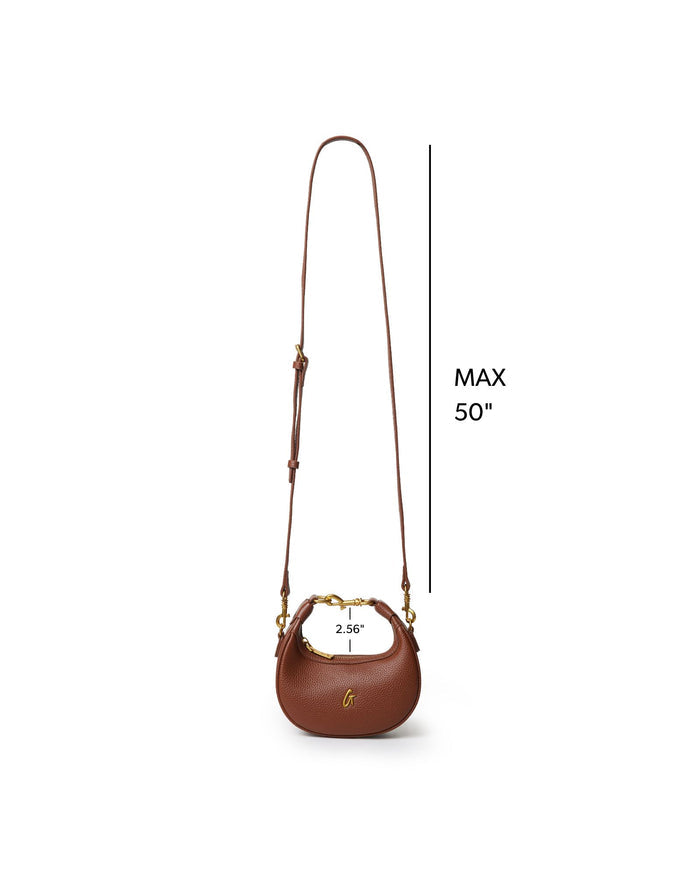 Brown Nano Pebble Hobo Bag with a stylish curved shape and adjustable strap, perfect for chic everyday use.