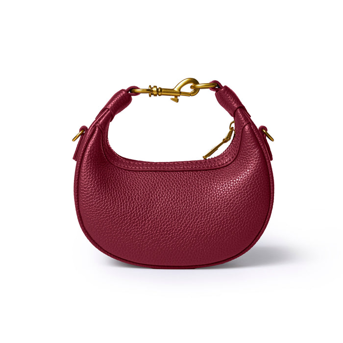 Burgundy NANO PEBBLE HOBO BAG featuring a textured finish and gold-tone hardware, perfect for stylish everyday use.