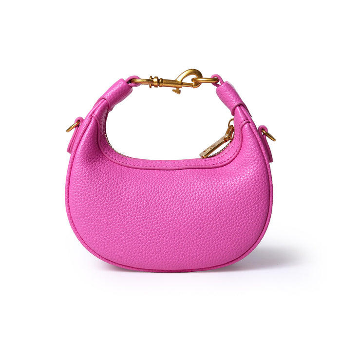 Bright pink Nano Pebble Hobo Bag with gold hardware, textured leather, and a zipper closure.