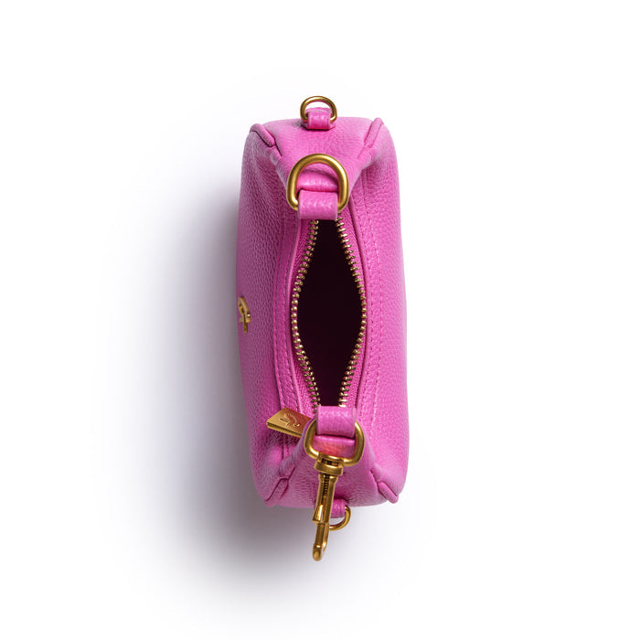 Pink Nano Pebble Hobo Bag with gold hardware, zipper closure, and detachable strap, viewed from above on a white background.