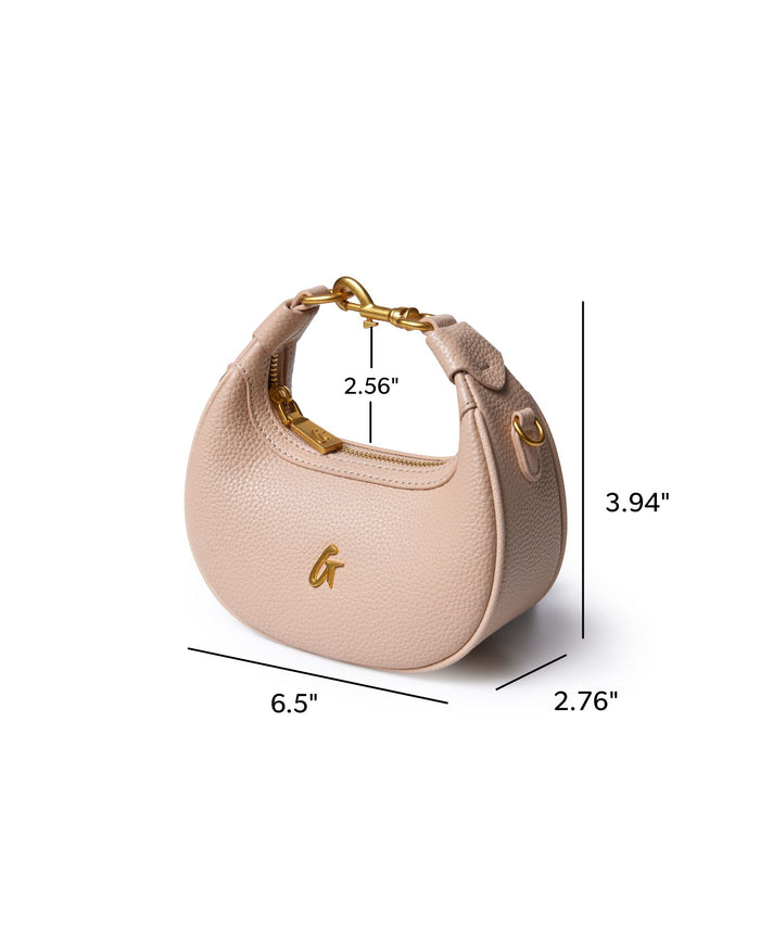 NANO PEBBLE HOBO BAG in nude with gold accents, featuring a stylish curved shape and compact design.