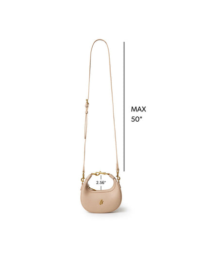 NANO PEBBLE HOBO BAG in nude with a stylish curved shape and adjustable strap for versatile wear.