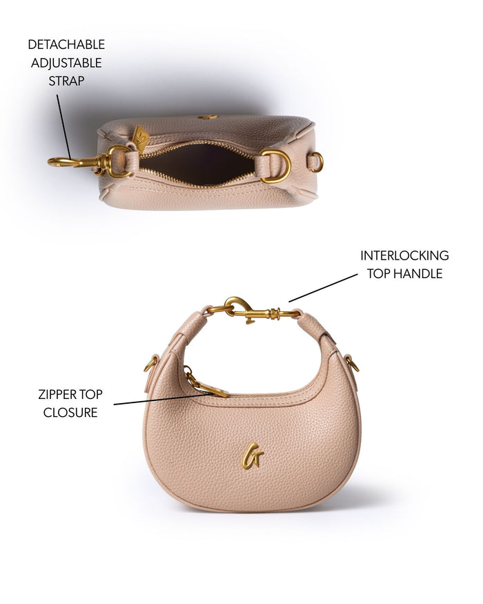Nude Nano Pebble Hobo Bag with interlocking top handle and detachable adjustable strap for versatile styling.