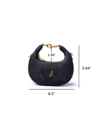 Black nano suede hobo bag with gold hardware and logo, featuring a curved design and compact dimensions.
