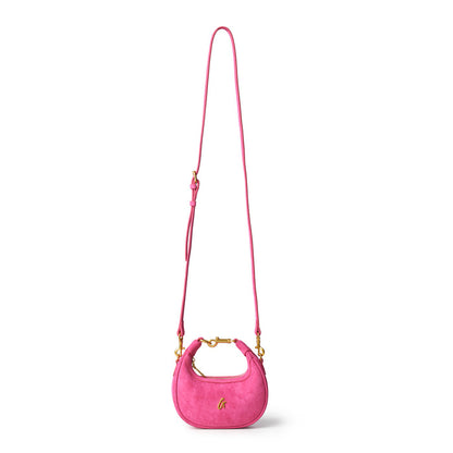 Hot pink nano suede hobo bag with a gold chain detail and adjustable strap, perfect for stylish everyday use.