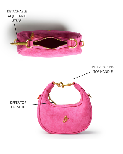 Hot pink nano suede hobo bag featuring a detachable adjustable strap and interlocking top handle with zipper closure.