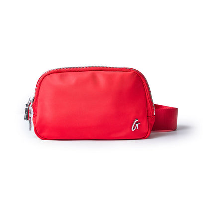 Red nylon fanny pack with a silver zipper and a small metallic logo on the front, adjustable strap on the side.