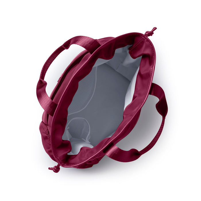 Burgundy nylon lunch bag with a spacious interior and dual handles for easy carrying. Ideal for stylish meals on the go.