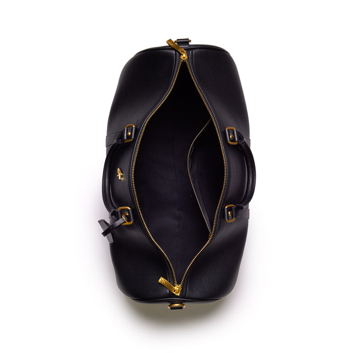 Open black Pebble Duffle Bag with gold zipper and interior compartment, showing spacious storage and sturdy design.