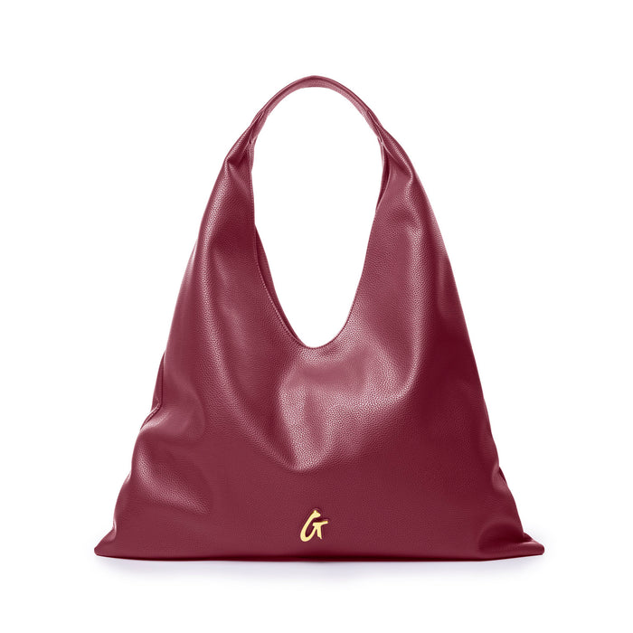 Burgundy pebble hobo shoulder bag with a slouchy design and a gold logo accent, perfect for stylish everyday use.