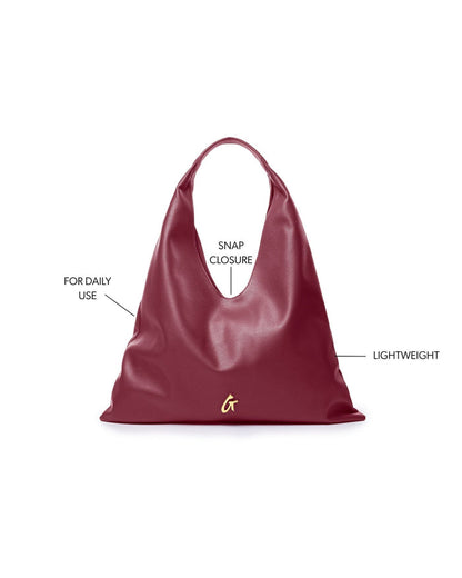 Burgundy Pebble Hobo Shoulder Bag with snap closure, designed for daily use and lightweight for easy carrying.