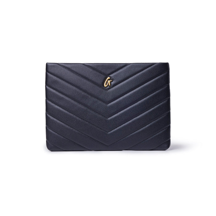 Black pebble laptop sleeve featuring a chevron design and a gold logo, perfect for stylish protection of your device.