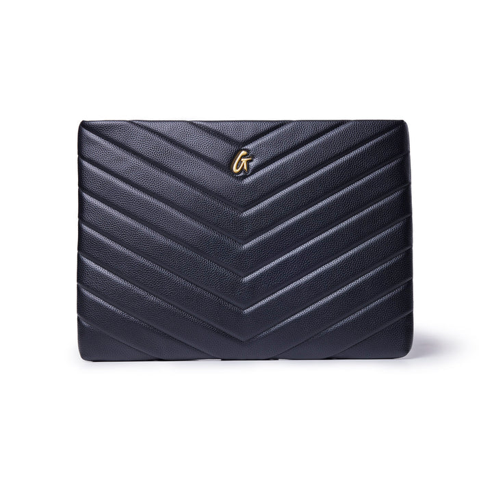 Black pebble laptop sleeve featuring a chevron design and a gold logo, perfect for stylish protection of your device.