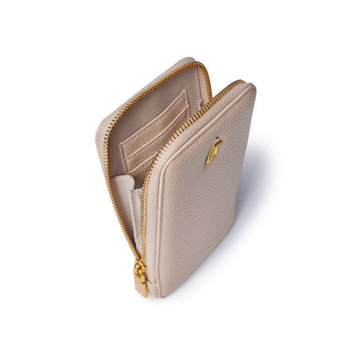 Beige pebble-textured crossbody phone bag with gold zipper and logo, open to show interior card slots and compartments.