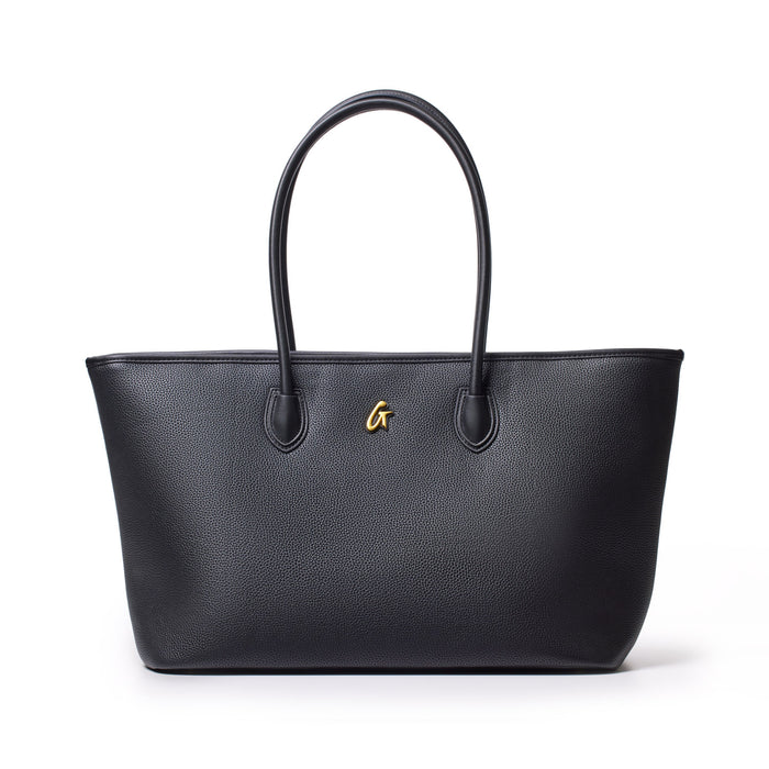 Black pebble tote bag with dual handles and a small gold logo on the front.