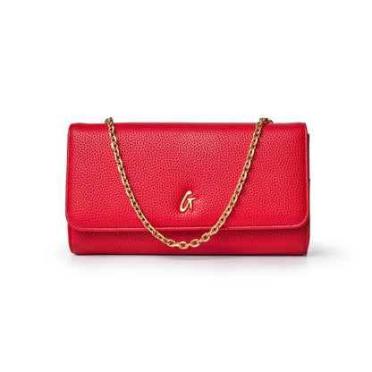 Red Pebble Travel Wallet with a gold chain and a gold "G" logo on the front, designed for travel and organization.