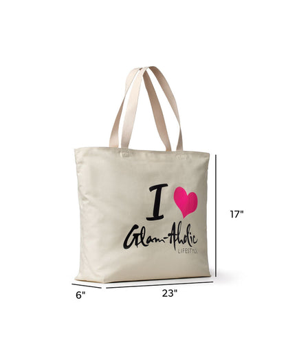 Hot pink canvas tote bag featuring the Glam-Aholic Lifestyle logo, ideal for stylish and affordable everyday use.