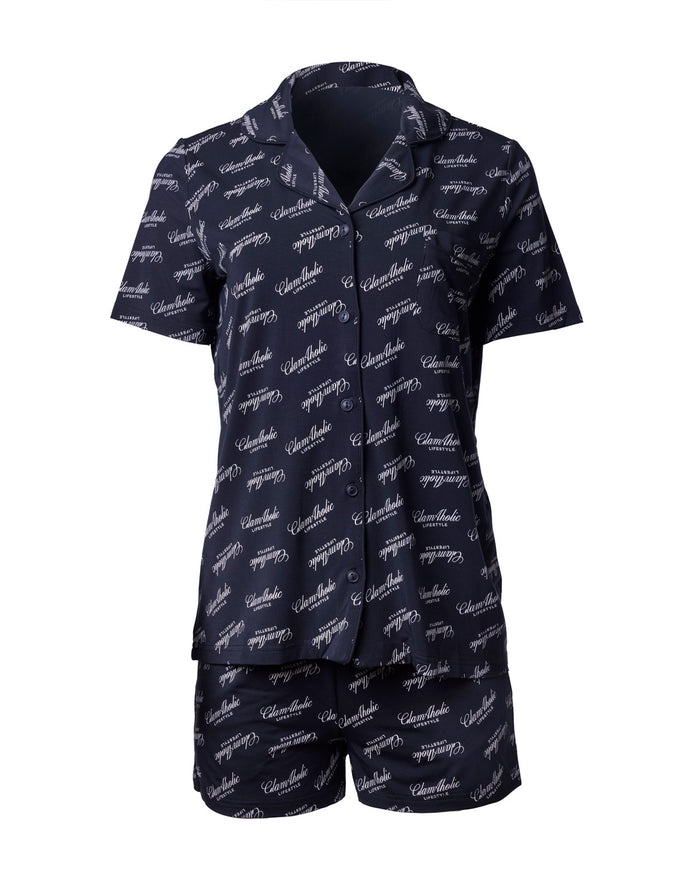 Black pajama short set featuring a stylish print and a comfortable, relaxed fit, perfect for lounging at home.