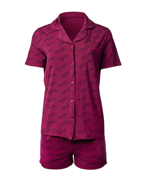 Burgundy pajama short set featuring a button-up top with a pocket and matching shorts, adorned with a signature print.