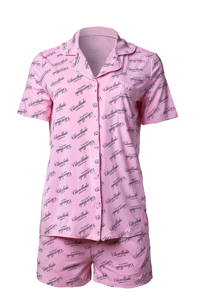 Light pink pajama short set featuring a stylish print, perfect for comfortable and chic lounging.