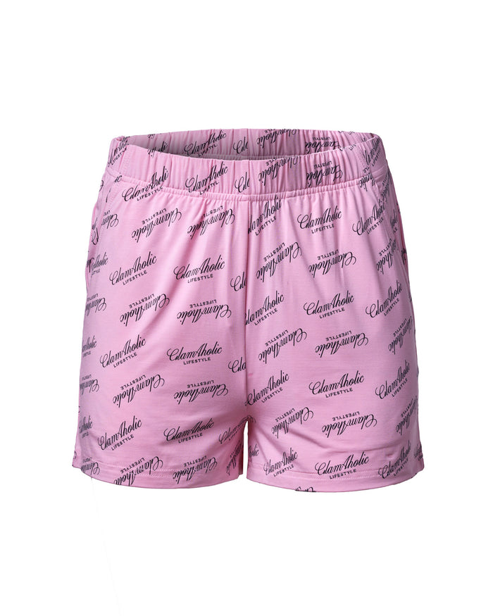 Light pink pajama shorts featuring a stylish Glam-Aholic logo print, perfect for comfortable, chic loungewear.