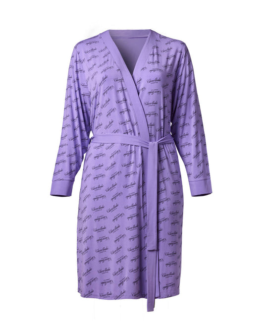 Lavender robe featuring a stylish signature print, perfect for luxurious lounging and relaxation.