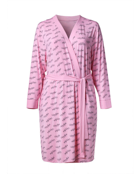 Light pink robe featuring a stylish signature print, perfect for luxurious lounging and everyday comfort.