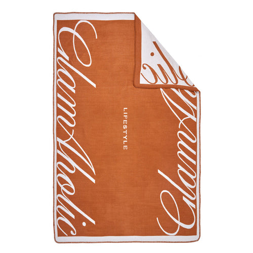 Brown luxury throw blanket with white cursive "Signature" text and "LIFESTYLE" in the center.