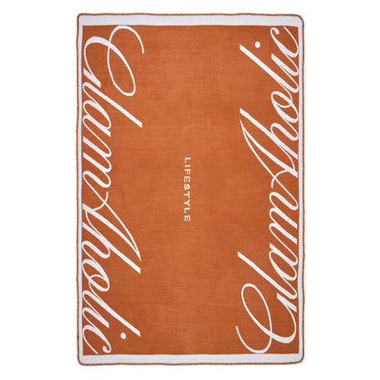 Brown luxury throw blanket with white cursive "California" text and "LIFESTYLE" in the center.