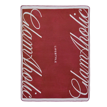 Burgundy throw blanket featuring the Glam-Aholic logo in a stylish design, perfect for cozying up in luxury.
