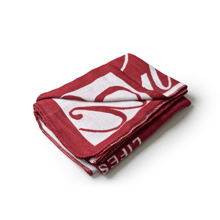 Burgundy throw blanket featuring a stylish logo design, perfect for adding luxury and comfort to any space.