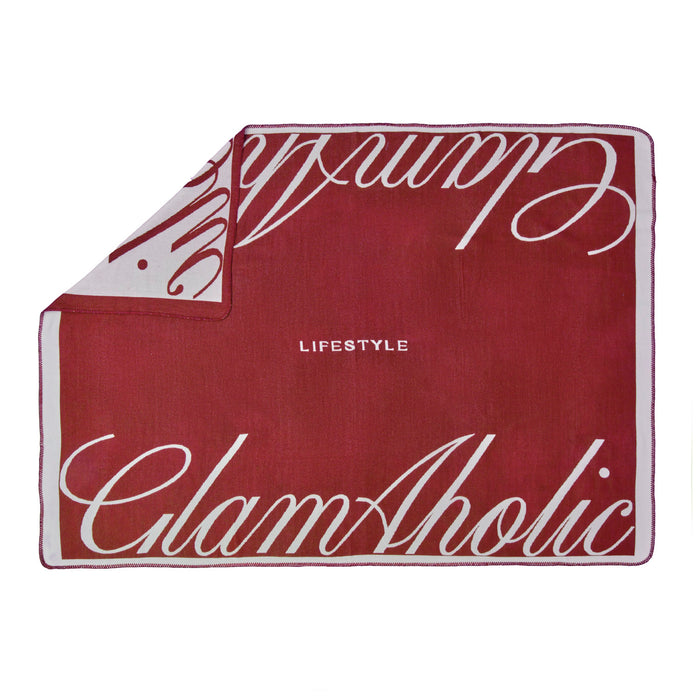 Burgundy throw blanket featuring Glam-Aholic logo and Lifestyle text, perfect for adding luxury to any space.
