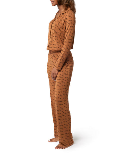 Brown long pajamas featuring a stylish print, designed for comfort and elegance in loungewear. Perfect for cozy nights.