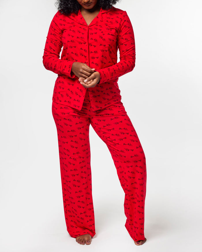 Red signature pajamas featuring a stylish print, designed for comfort and a chic look. Perfect for cozy nights.