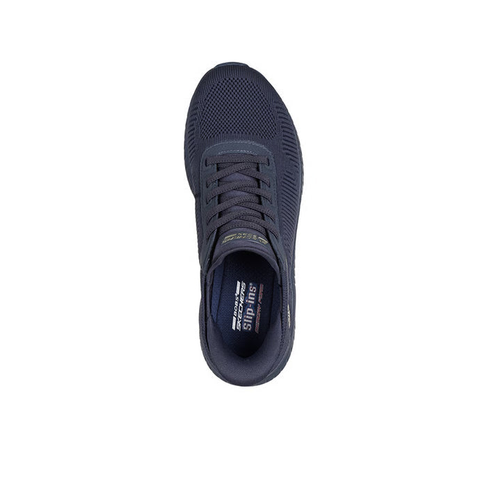 Women's slip-on sneaker, dark navy knit upper, heel view with lace-up and padded collar