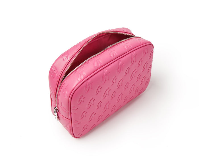 Small hot pink monogram toiletry bag with embossed logo pattern and silver zipper, ideal for travel essentials.