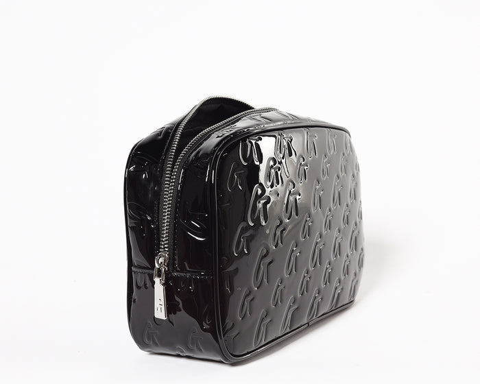 Small black monogram toiletry bag with a glossy finish, embossed with repeated "G" pattern and a mirror.