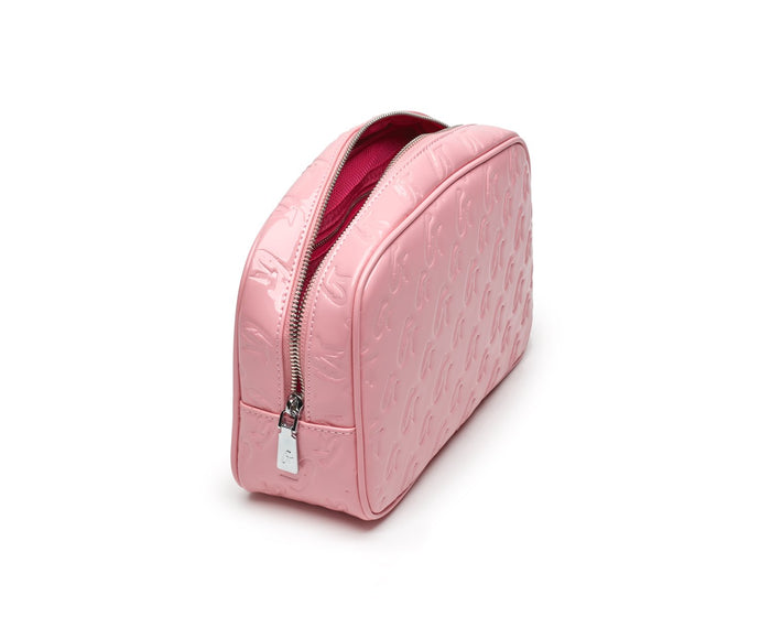 Small pink monogram toiletry bag with a reflective finish, embossed pattern, and a zipper closure.