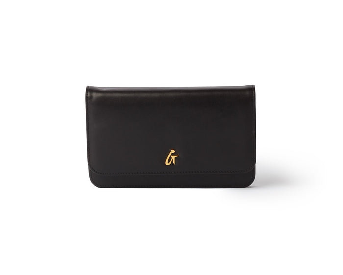 Black leather wallet with a gold "G" logo, featuring a sleek, minimalist design on a white background.