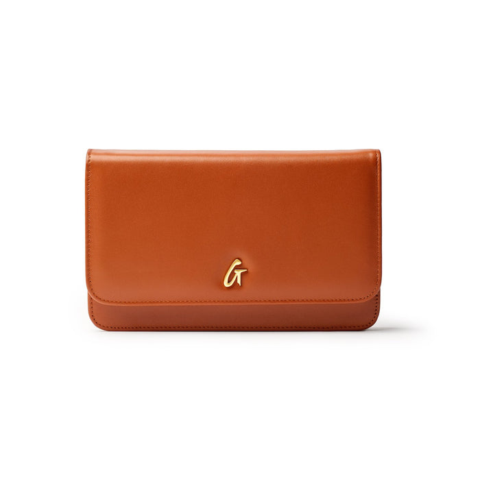 Brown leather wallet with a gold "G" logo on the front, featuring a sleek, minimalist design.