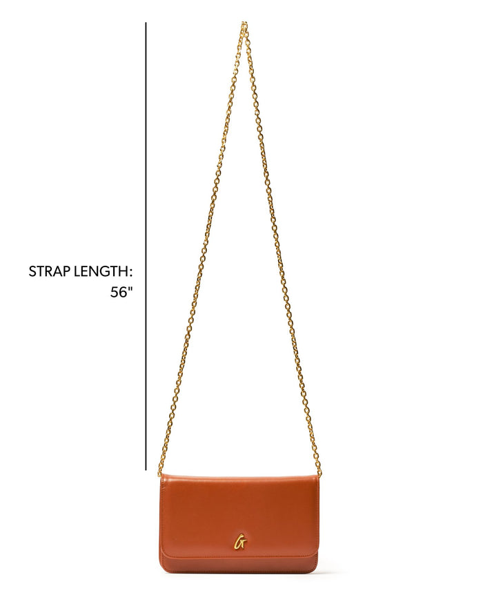 Brown STANDARD GOLD WOC handbag with a 56-inch gold chain strap, perfect for stylish, affordable luxury.