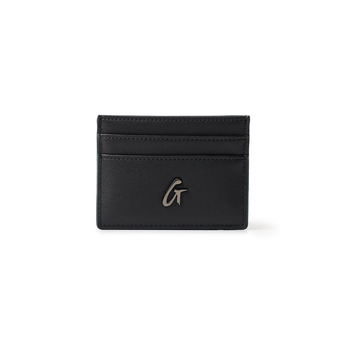 Black gunmetal card holder with three card slots and a metallic "G" logo on the front.