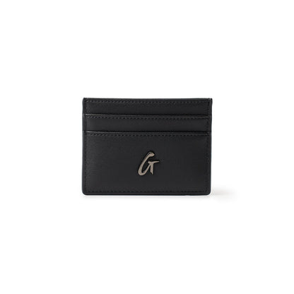 Black gunmetal card holder with three card slots and a metallic "G" logo on the front.