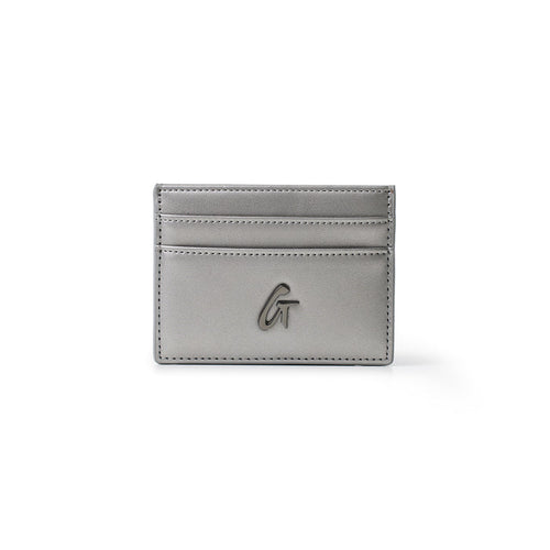 Gunmetal gray card holder with multiple card slots, a sleek design, and a metallic logo on the front.